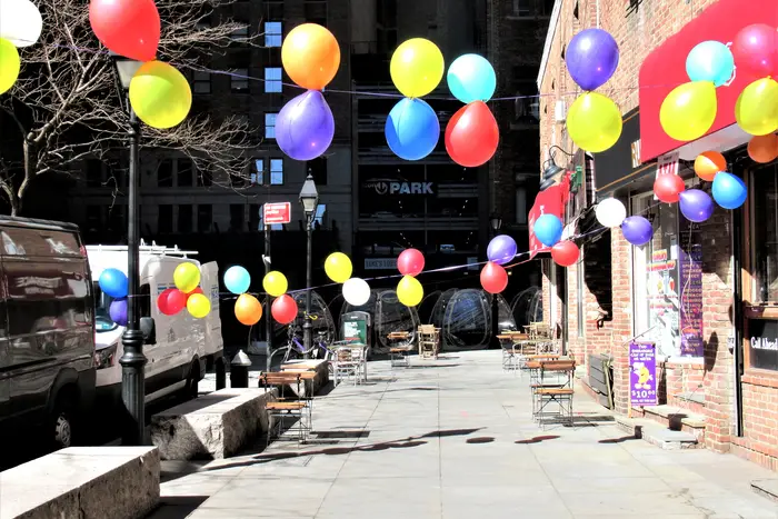 A photo of balloons up on Pearl Street in lower Manhattan